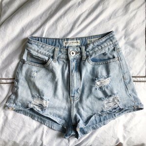 Vintage styled distressed denim mom shorts
